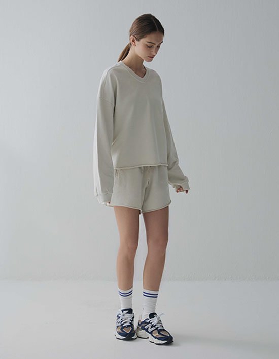 [em] E12 피그먼트 밴딩 숏츠_에쿠르